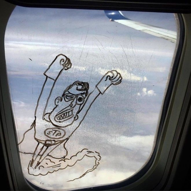Рисунки на окне самолета